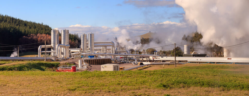 Geothermal power station pipeline and steam, Wairakei, New Zealand